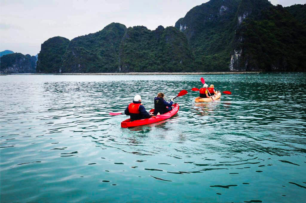 Paddle through emerald waters with Halong Bay Tours